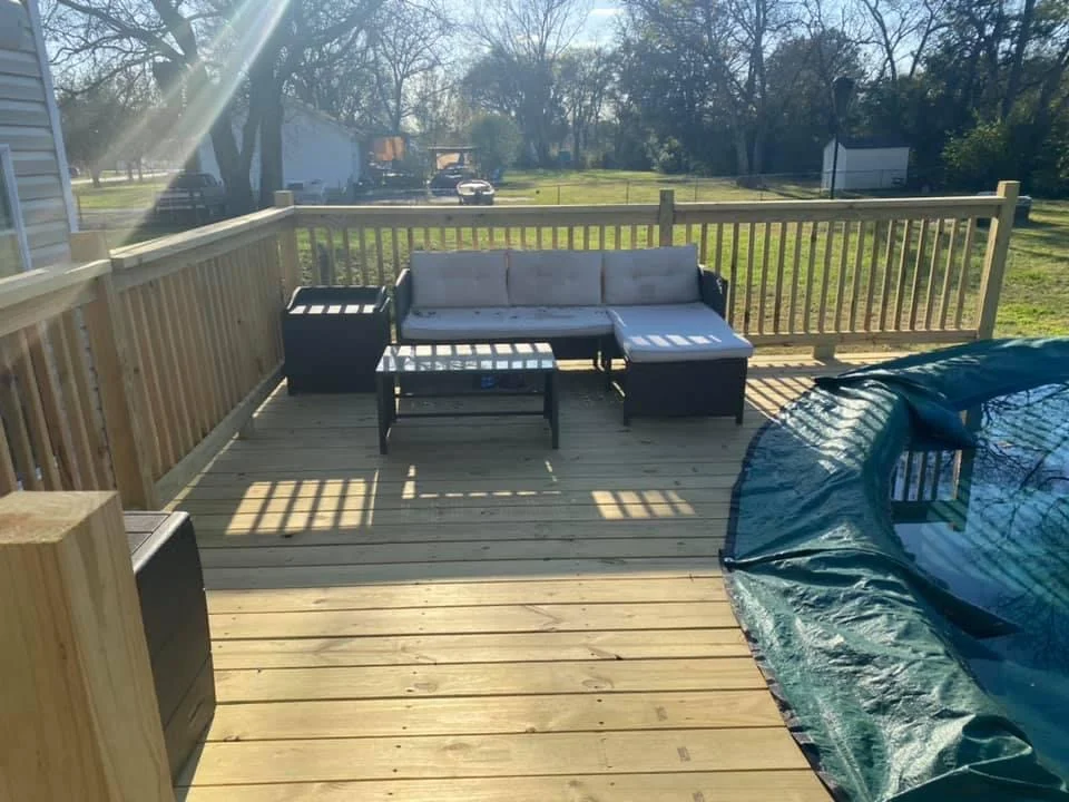Completed deck build with outdoor furniture